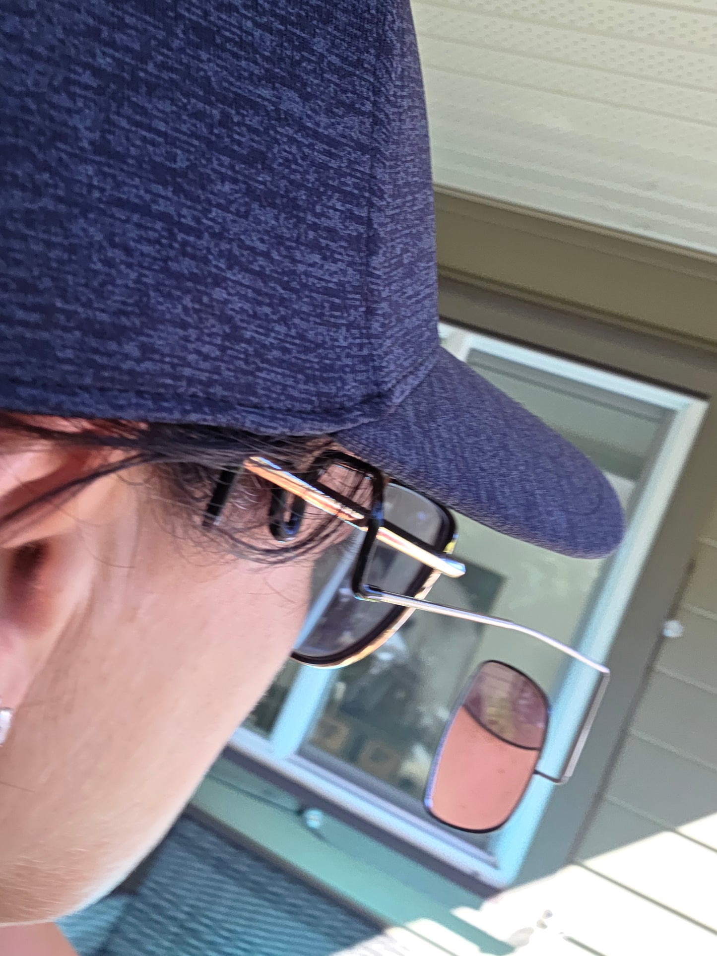 Clip on rear view mirror for your glasses.